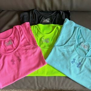 4 Under Armour Fitted Tanks